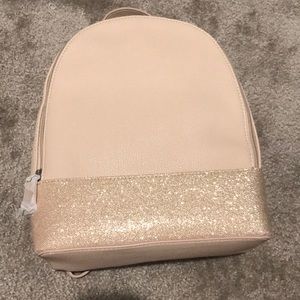 New glitter tan backpack